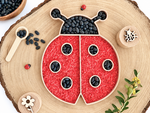 Bandeja rellenable mariquita para el juego infantil. wood medio y wood claro
