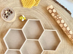 Bandeja sensorial infantil celda de abeja.