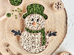 Bandeja sensorial rellenable muñeco de nieve  juego infantil.