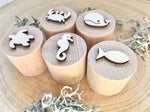 sellos madera animales marinos detalle